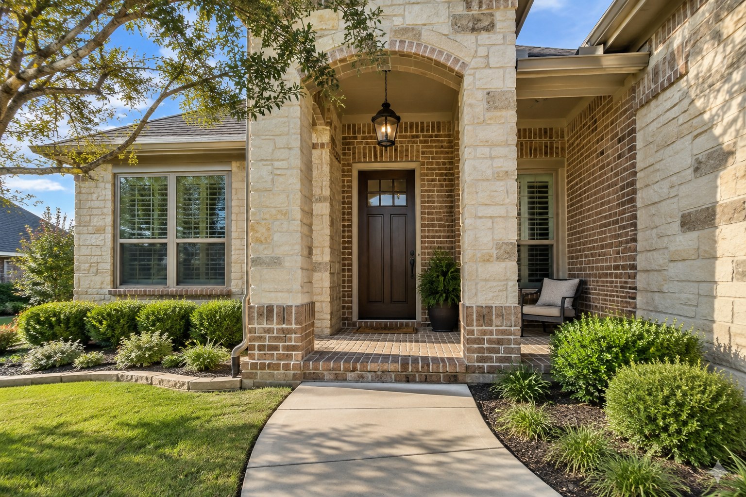 A covered front entry of a Texas home, illustrative